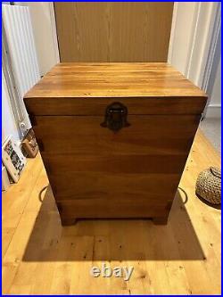 Large wooden box with hinged lid