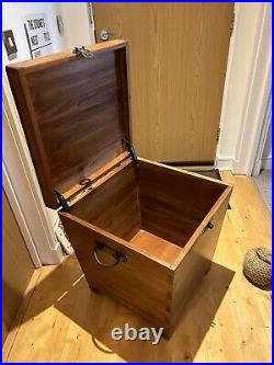 Large wooden box with hinged lid